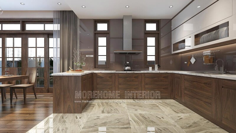 Thiết kế tủ bếp chung cư cao cấp với chất liệu gỗ óc chó nhập khẩu đóng vai trò chủ đạo tạo nên sự sang trọng, tinh tế, đồng thời thể hiện được sự đẳng cấp, gu thẩm mỹ của chủ nhân ngôi nhà Thiết kế và sản xuất tủ bếp đẹp