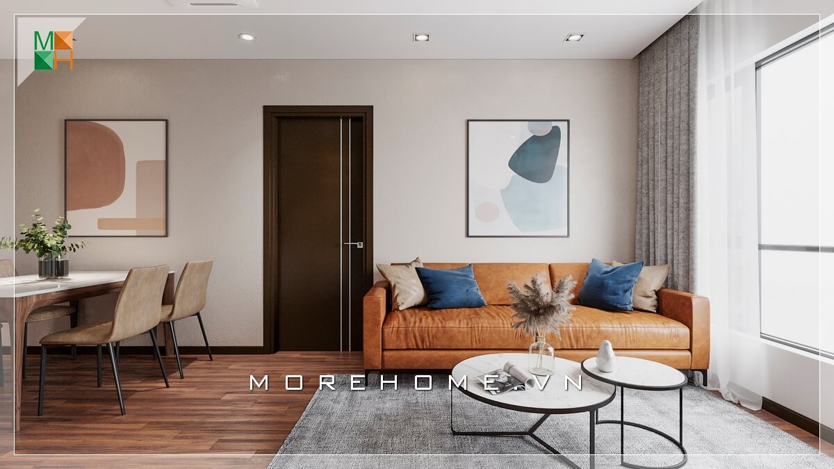 Giới thiệu mẫu ghế sofa bọc da bò nổi bật phù hợp với không gian phòng khách chung cư đơn giản, kết hợp mẫu bàn độc đáo 2 mặt tròn chồng lên nhau khiến căn phòng khách trở nên hiện đại và sang trọng hơn. Thiết kế nội thất phòng khách nhà phố
