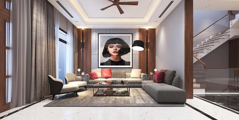 Trang trí nội thất phòng khách ấn tượng với phong cách hiện đại cùng cách trang trí sáng tạo từ điểm nhấn tranh treo tường nghệ thuật. Thiết kế nội thất phòng khách nhà phố