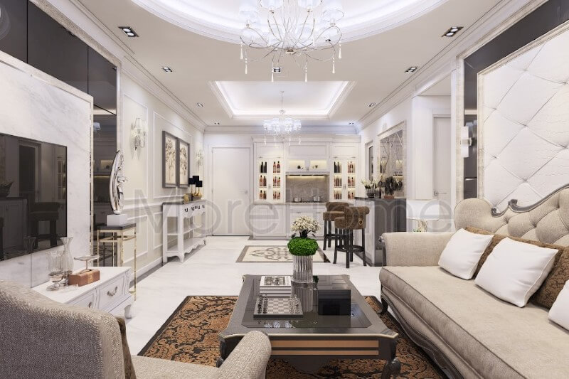 Bộ sofa bọc nỉ khá đơn giản nhưng vẫn là điểm nhấn chính trong không gian phòng khách. Sự tối giản của bộ sofa chữ i và một chiếc sofa đơn tạo hiệu ứng không gian tiếp khách thêm phần sang trọng và rộng lớn hơn sofa tân cổ điển