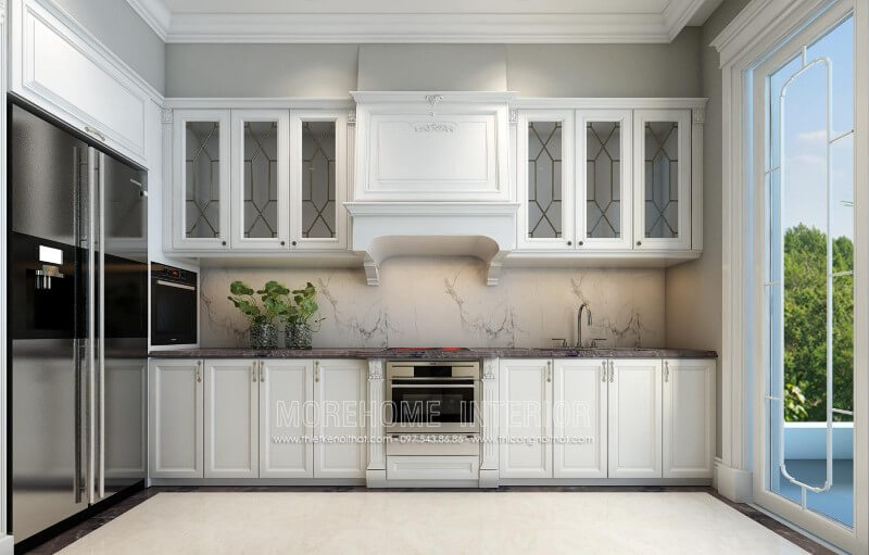 Mẫu tủ bếp tân cổ điển được thiết kế một cách tối giản, các đường nét chi tiết chạm khắc không quá cầu kì mà tập trung vào công năng sử dụng của sản phẩm mang đến một nhà bếp sang trọng mà không bị rối mắt Thiết kế và sản xuất tủ bếp đẹp