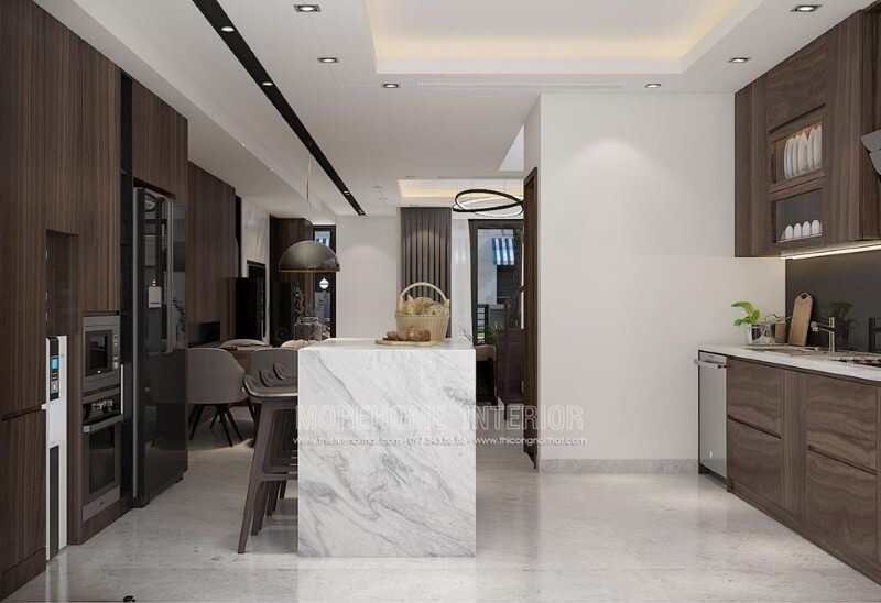 Tủ bếp gỗ veneer sậm màu kết hợp bàn đảo ốp đá tạo nên vẻ đẹp sang trọng cuốn hút cho phòng bếp. Nội thất phòng bếp