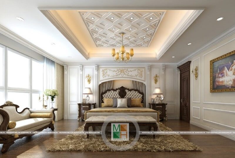 Thiết kế nội thất phòng ngủ chung cư Mandarin cao cấp theo phong cách tân cổ điển với tông màu vàng kim cũng gây ấn tượng, lôi cuốn mọi ánh nhìn.